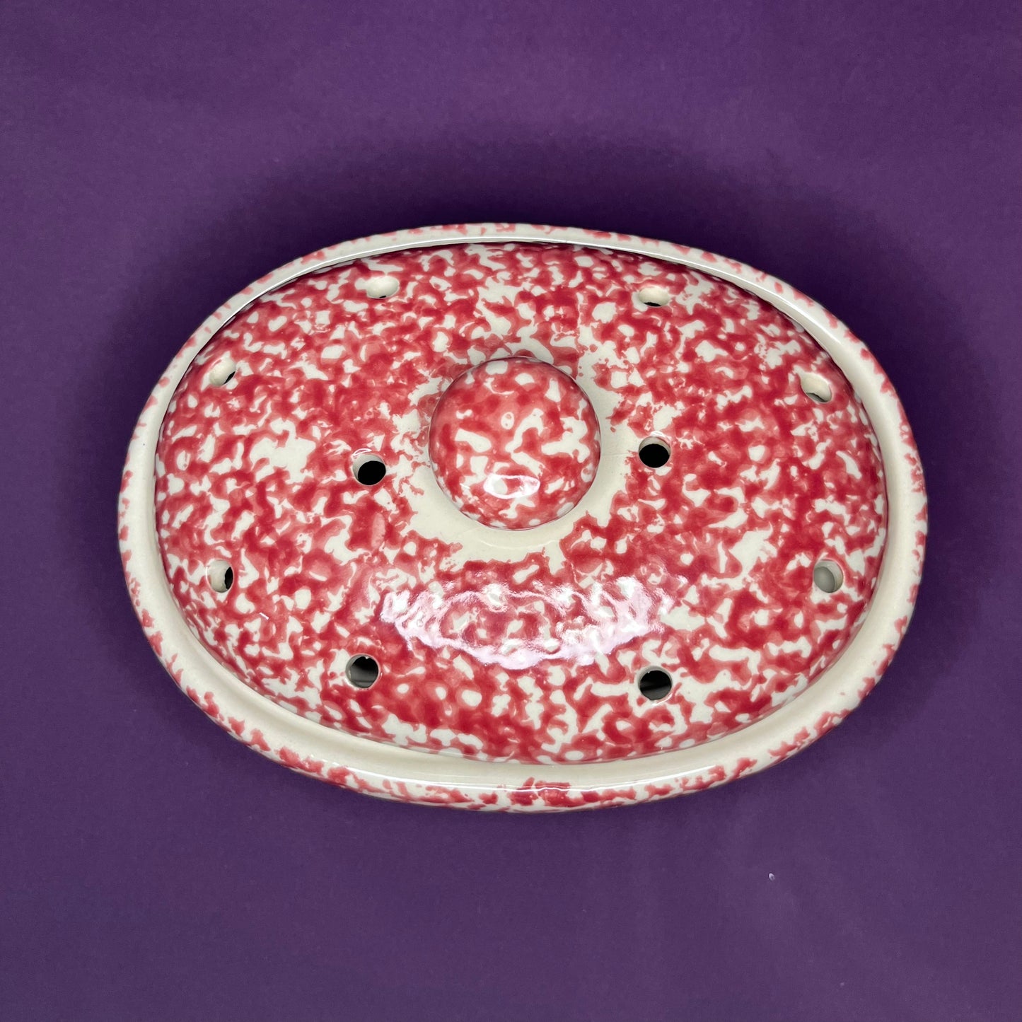 Vintage red spongeware steamer dish with heart motif