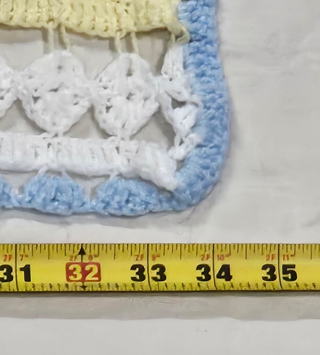 43" x 34" lacy crocheted decorative blanket in pastel colors