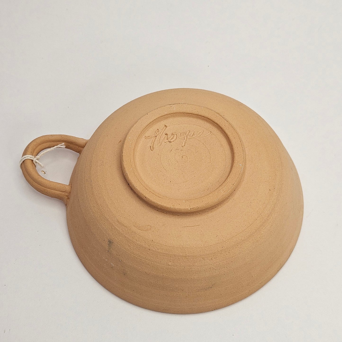 Thorpe pottery, signed, hand thrown bowl, clay outside glazed inside