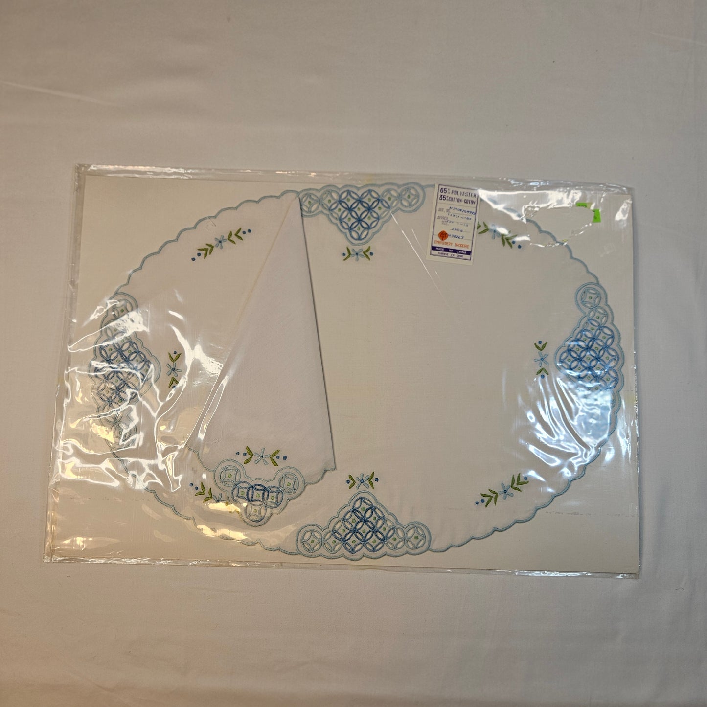 Vintage embroidered placemats and napkins, set of 8, never used