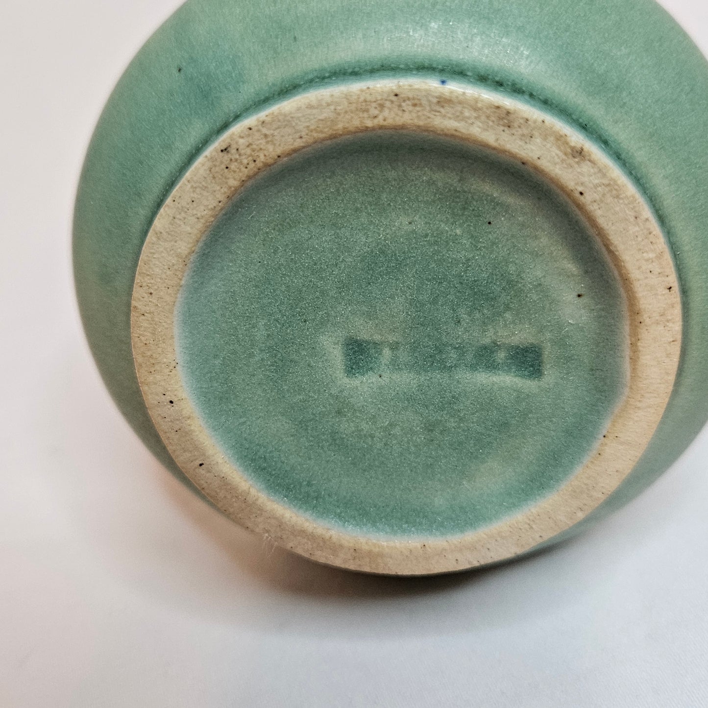 Vintage Niloak Pottery small green bud vase, 3.75 inches tall