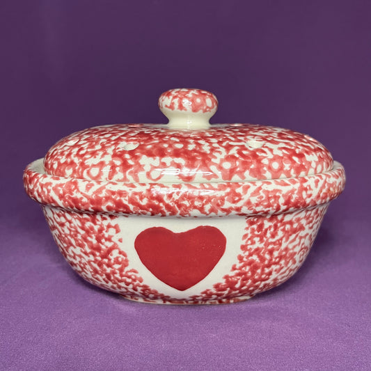 Vintage red spongeware steamer dish with heart motif