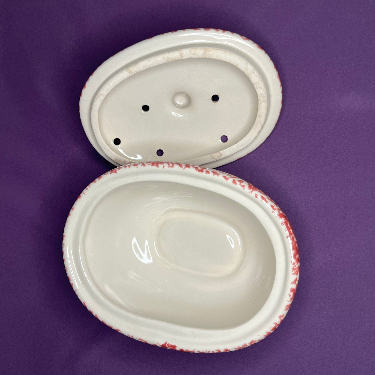 Vintage red spongeware steamer dish with heart motif