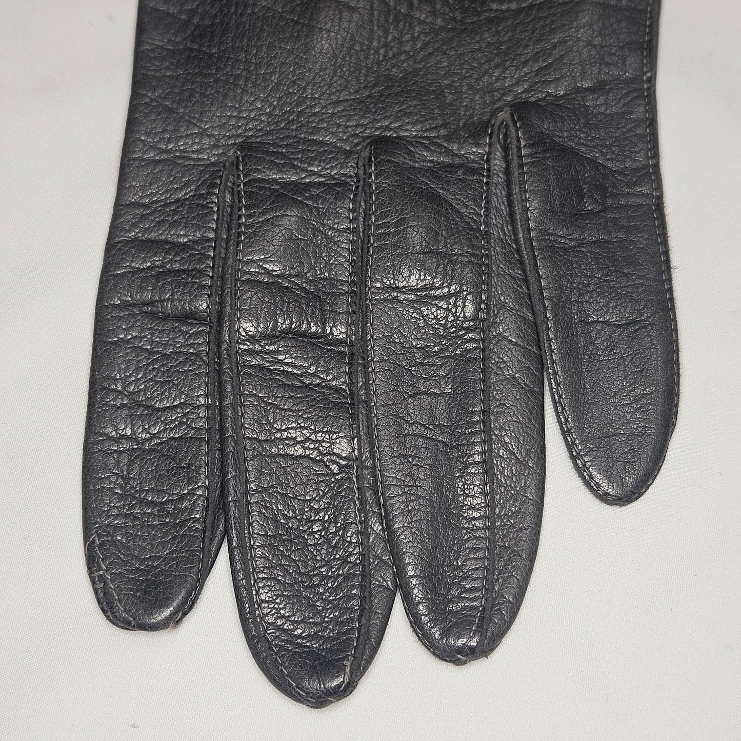 Vintage women's long grey leather unlined gloves. Made in Italy for Macy Associates.