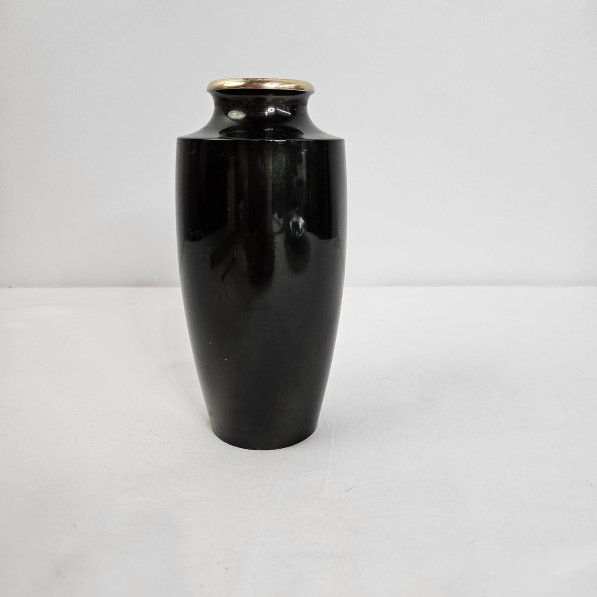 Black enamel vase with Japanese inspired landscape scene and gold accents