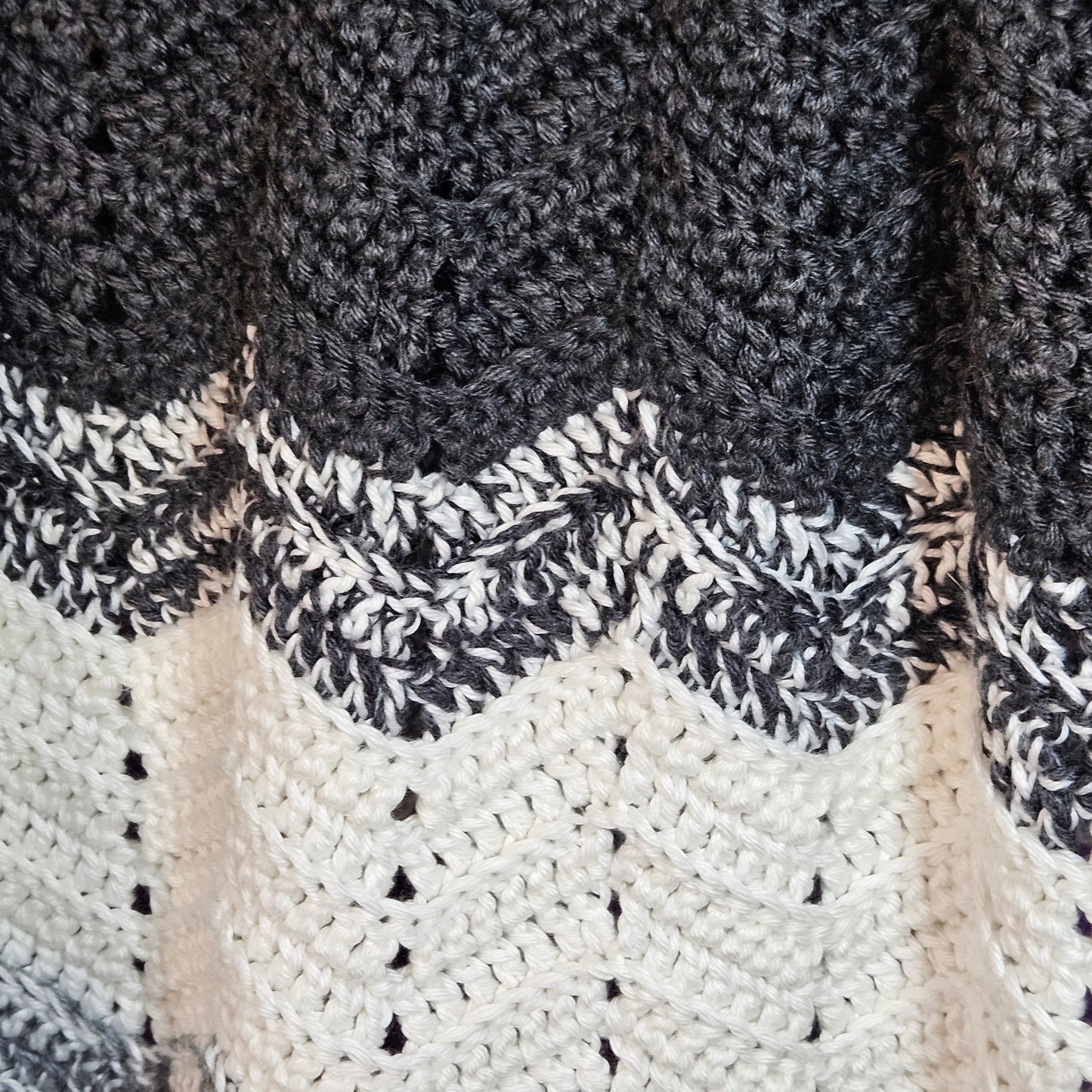 Handmade crochet heavy blanket in black, white, and grey, 45" x 39"