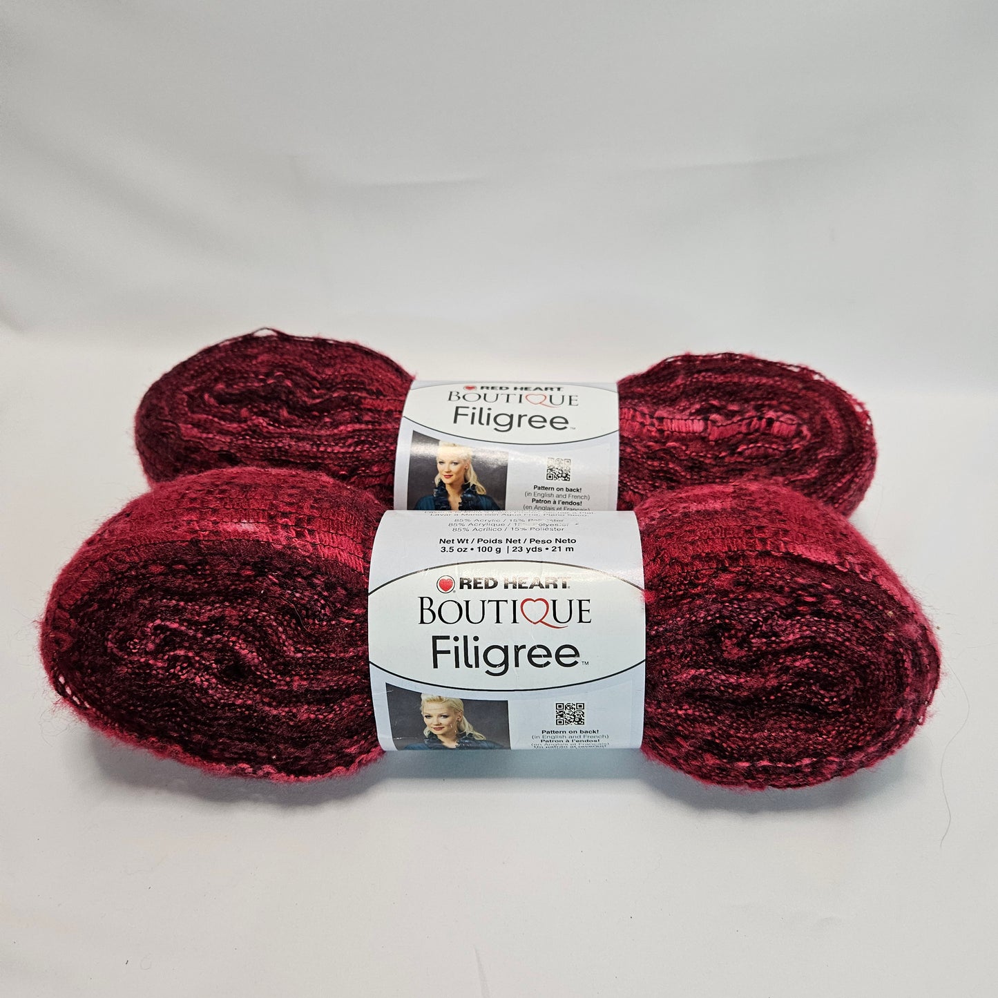 Red Heart Filigree super bulky yarn, color Jubilee 2 skeins