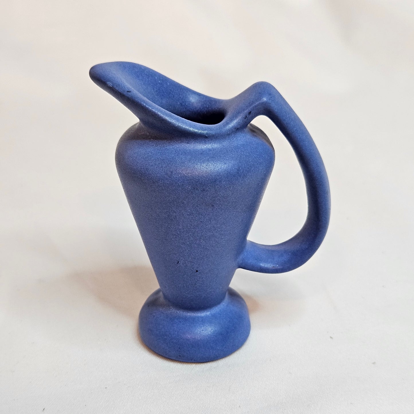 Vintage Niloak Pottery miniature pitchers, 3.25 inches tall