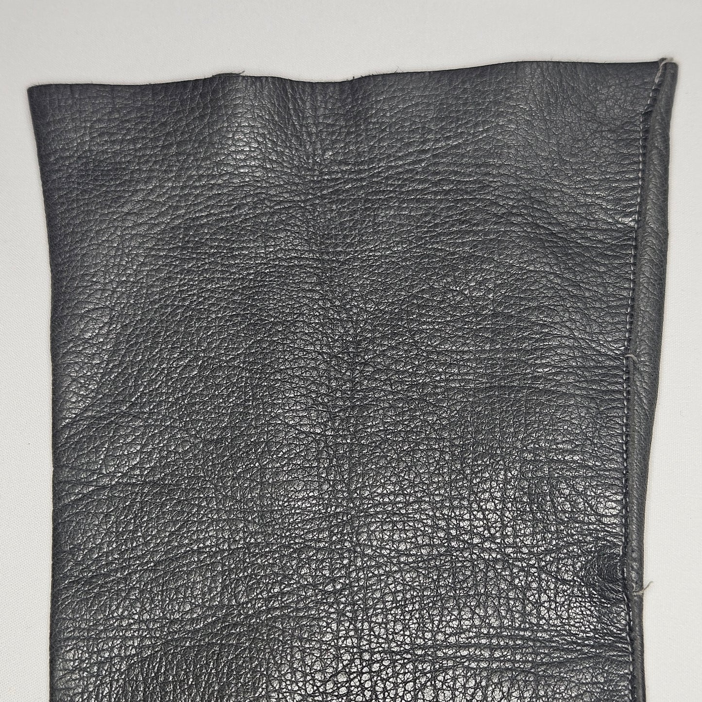 Vintage women's long grey leather unlined gloves. Made in Italy for Macy Associates.