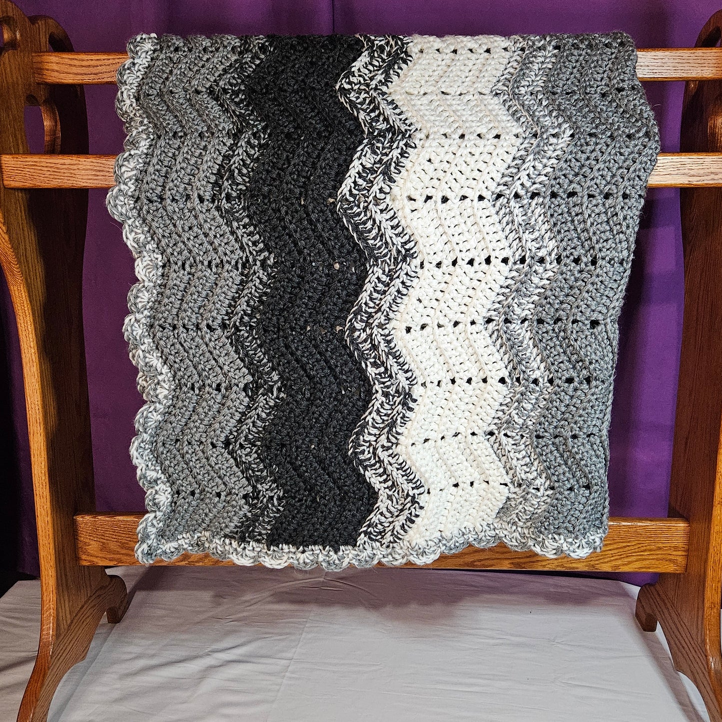Handmade crochet heavy blanket in black, white, and grey, 45" x 39"