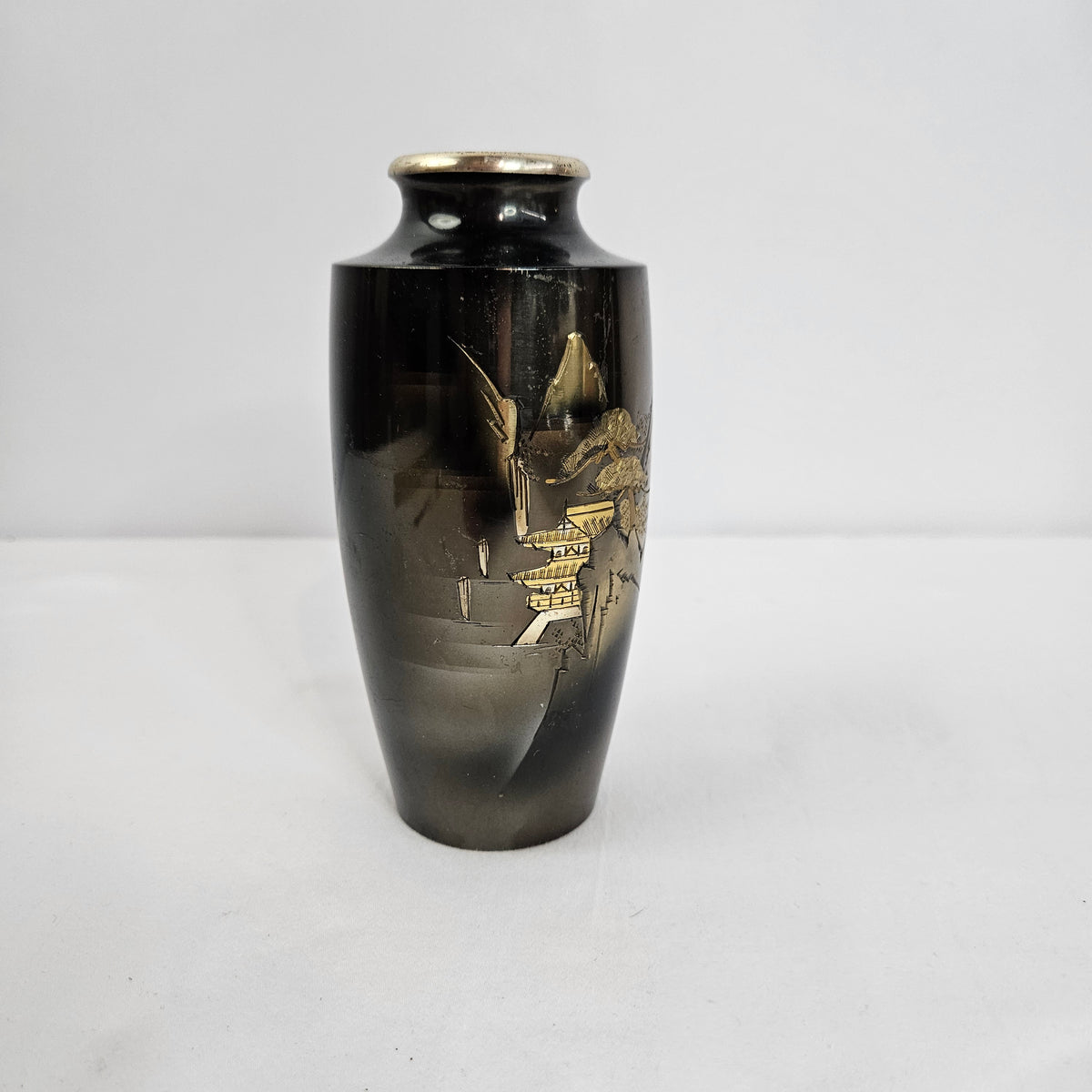 Black enamel vase with Japanese inspired landscape scene and gold accents