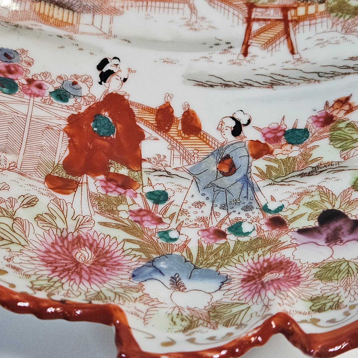 Geisha girl vintage hand painted plate, leaf shaped