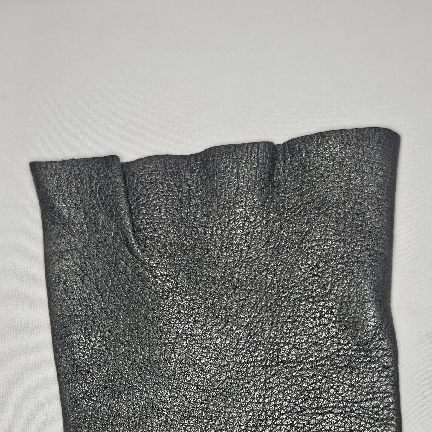 Vintage women's long grey leather unlined gloves. Made in Italy for Macy Associates.