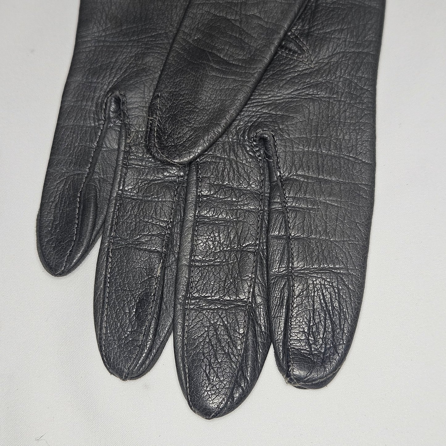 Vintage women's long grey leather unlined gloves. Made in Italy for Macy Associates.