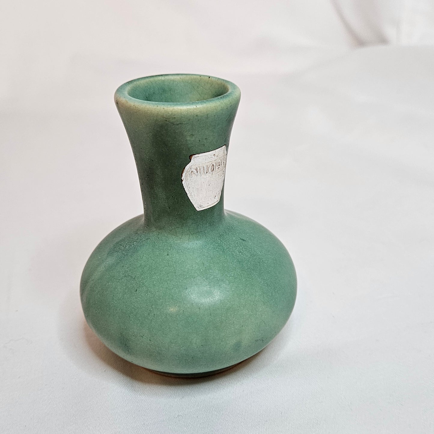 Vintage Niloak Pottery small green bud vase, 3.75 inches tall