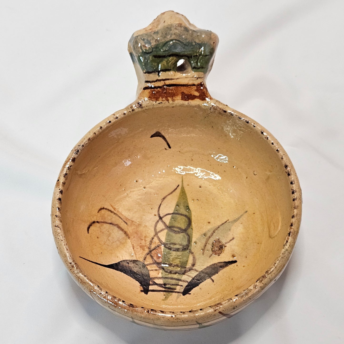 Vintage Mexican primitive clay bowl with handle