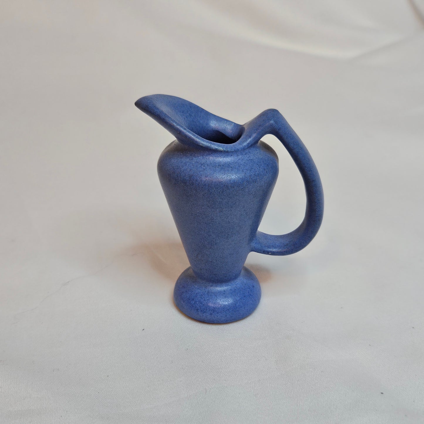 Vintage Niloak Pottery miniature pitchers, 3.25 inches tall