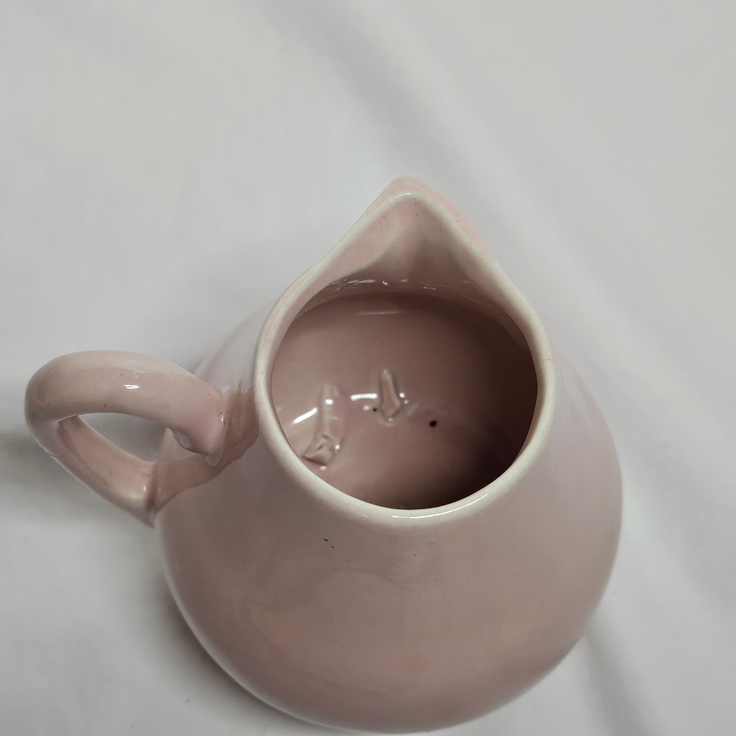 Niloak small creamer pitcher, light pink, 4 inches tall