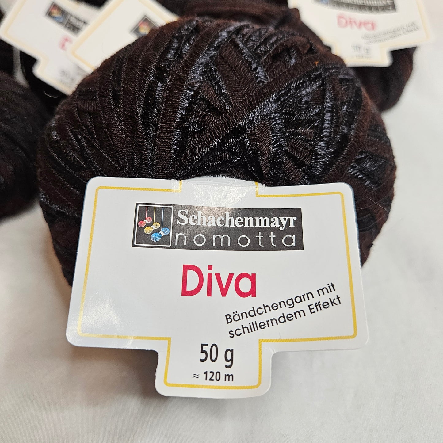 Schachenmayr Nomotta DIVA ribbon yarn, Black/Brown, lot of 8 balls
