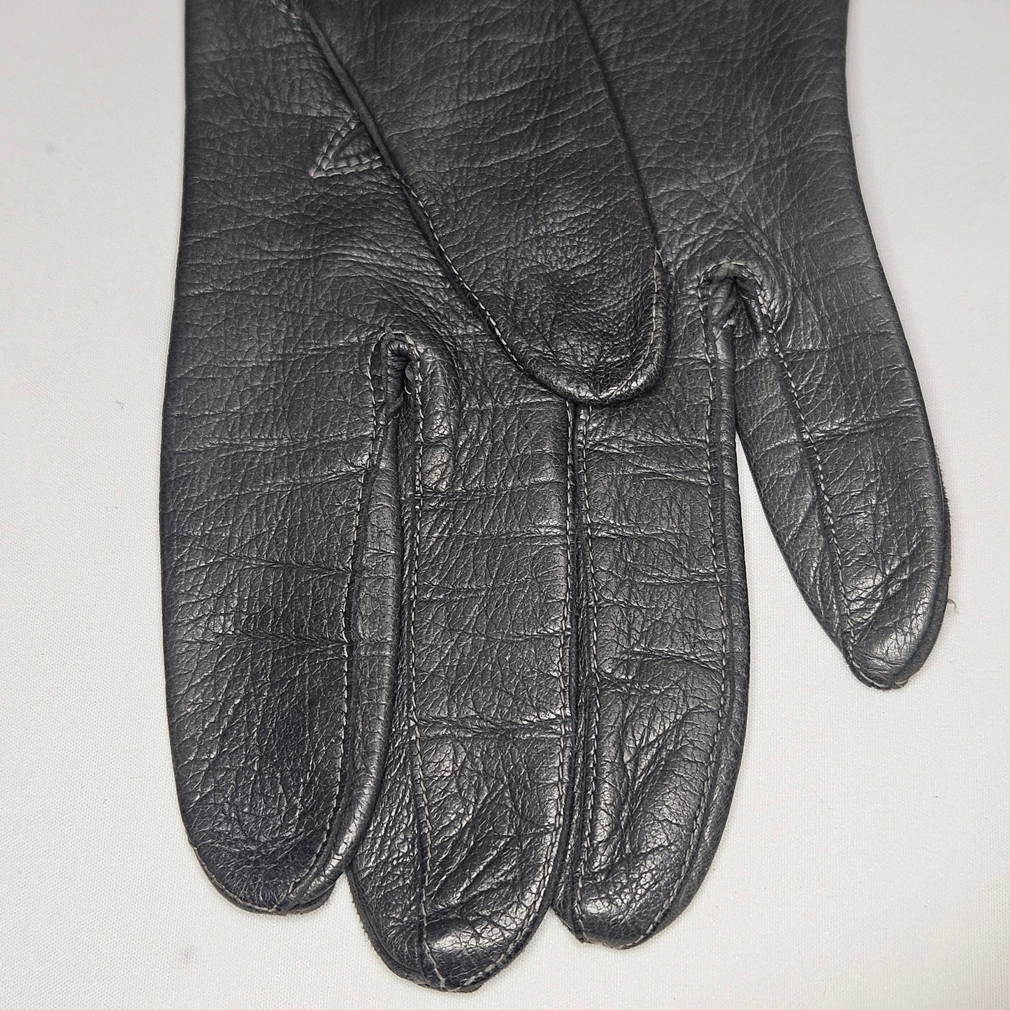 Vintage women's long grey leather unlined gloves. Made in Italy for Macy Associates.