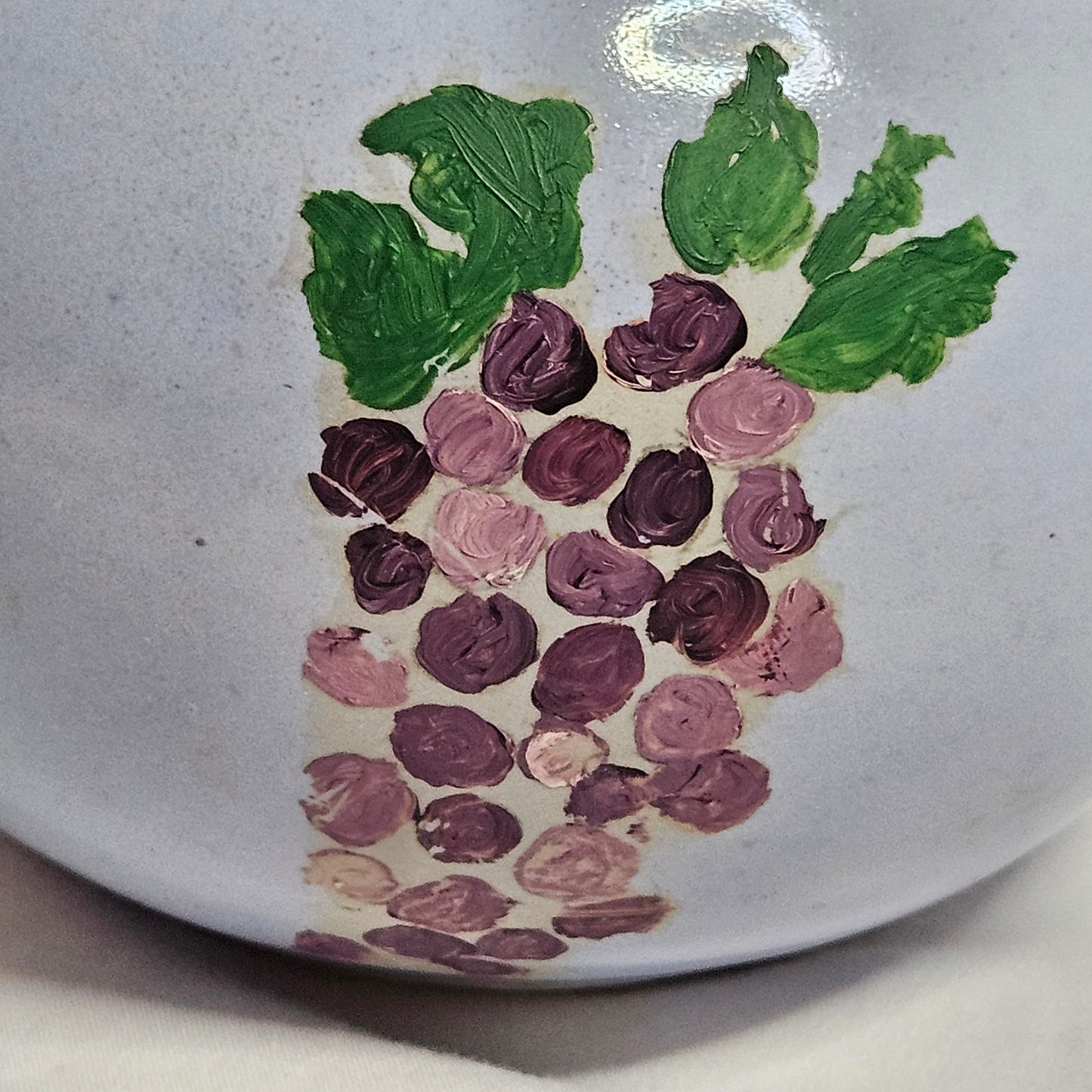 Vintage Niloak Pottery small light blue pitcher with hand-painted grape clusters