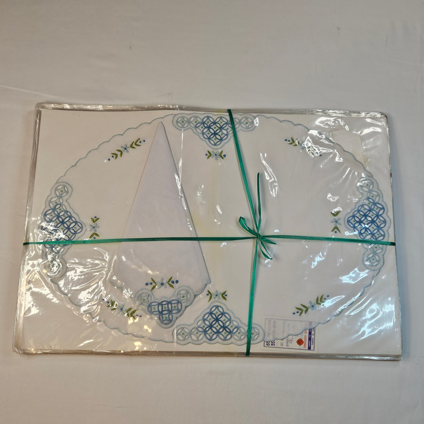 Vintage embroidered placemats and napkins, set of 8, never used