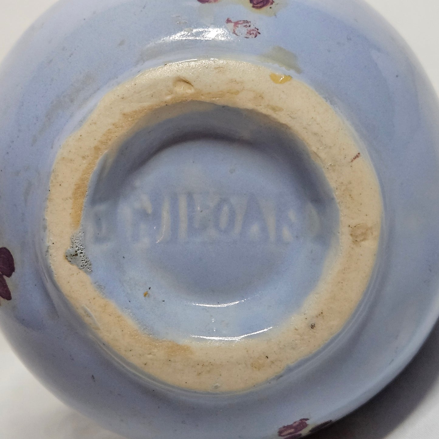 Vintage Niloak Pottery small light blue pitcher with hand-painted grape clusters