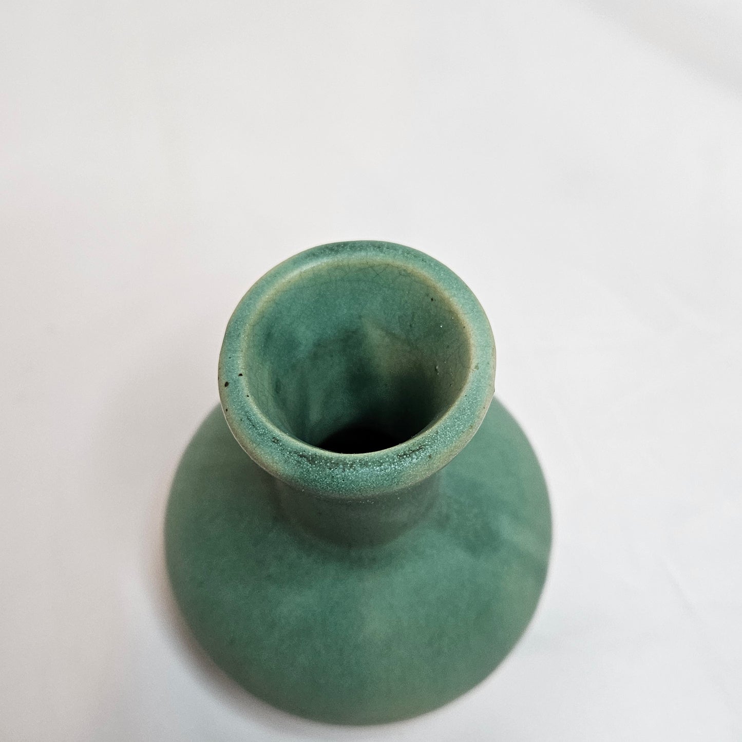 Vintage Niloak Pottery small green bud vase, 3.75 inches tall