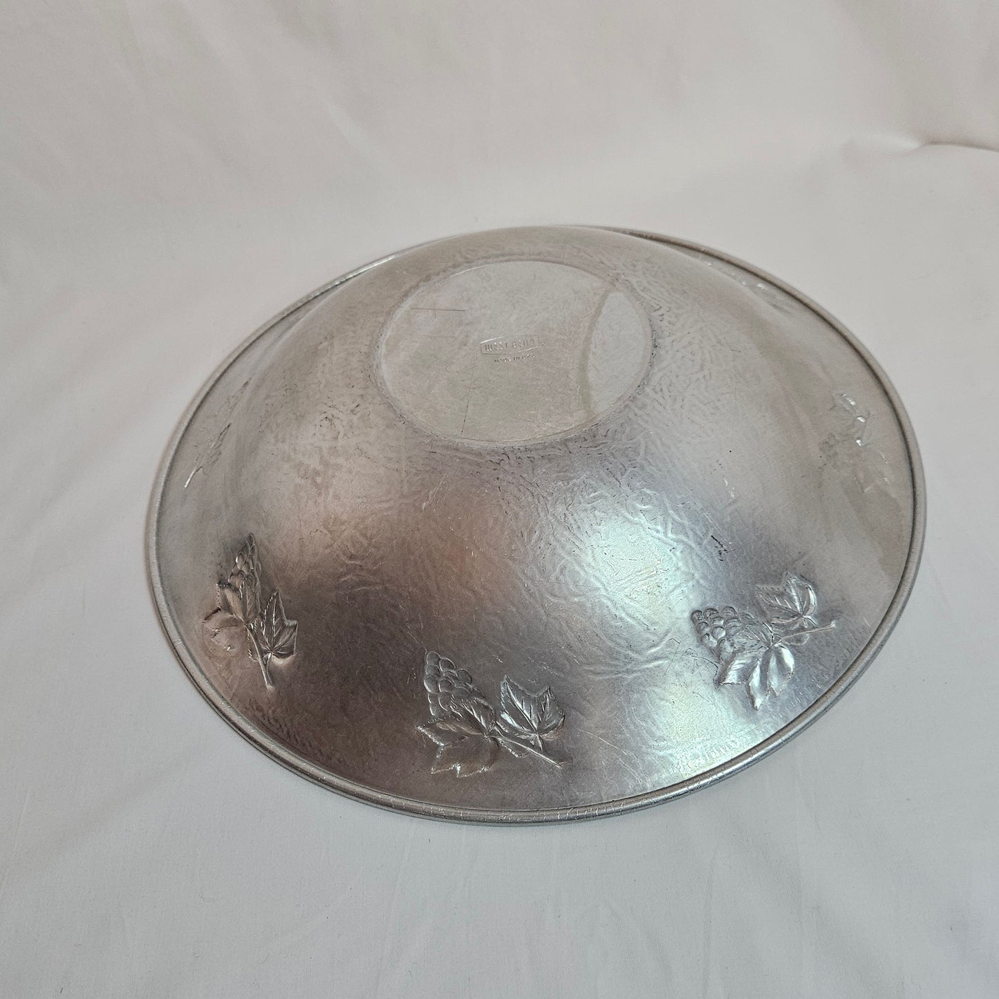 Vintage West Bend 14" aluminum serving bowl with grape cluster and leaf design