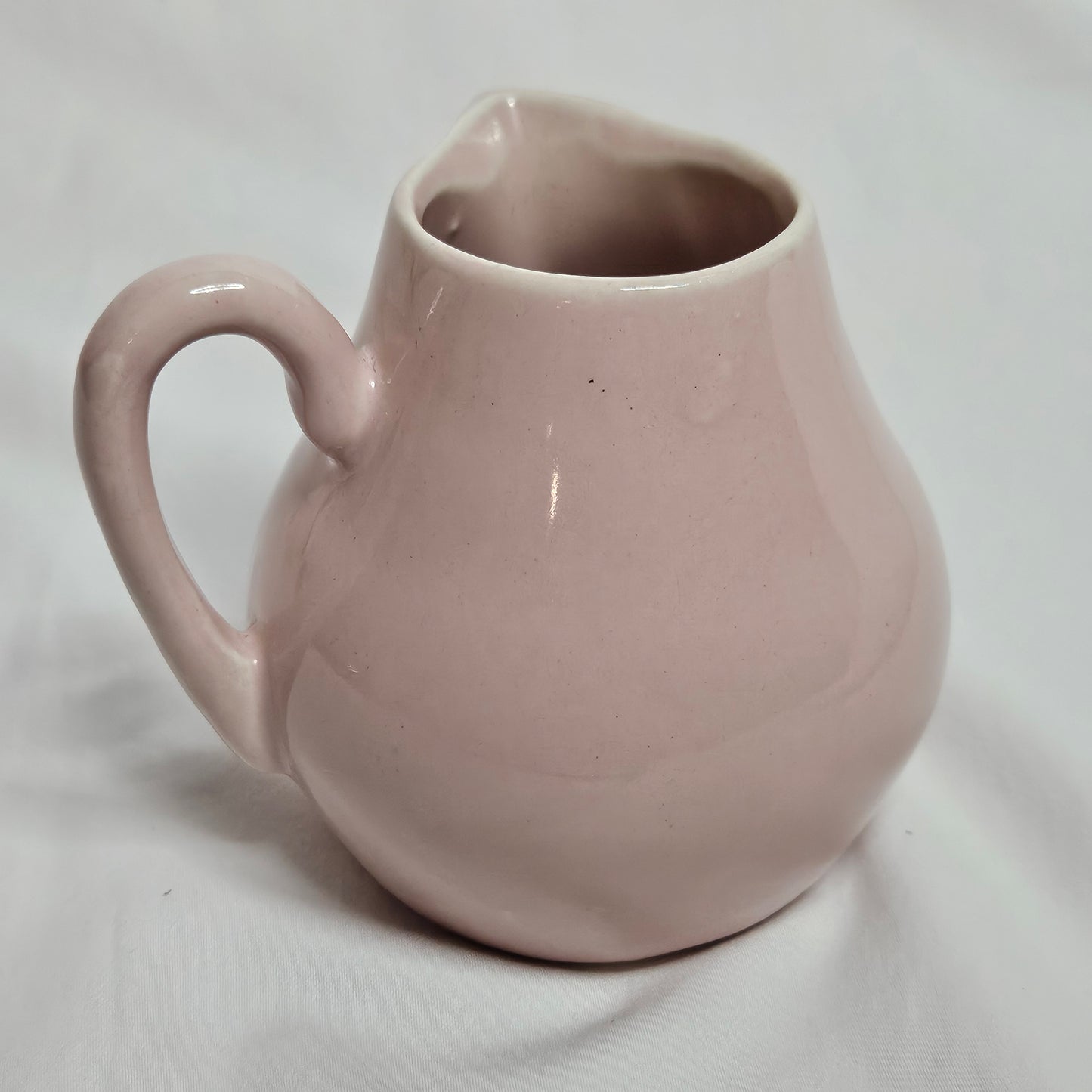 Niloak small creamer pitcher, light pink, 4 inches tall