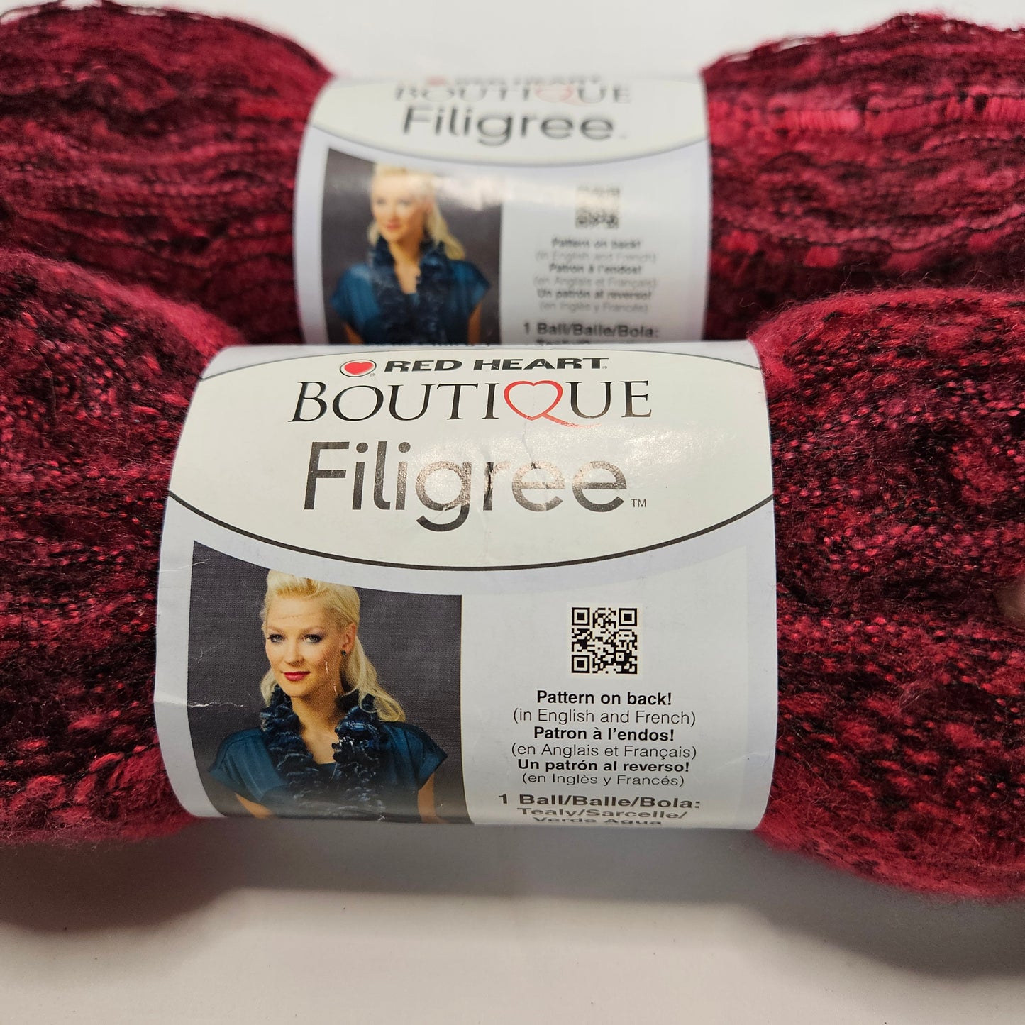 Red Heart Filigree super bulky yarn, color Jubilee 2 skeins