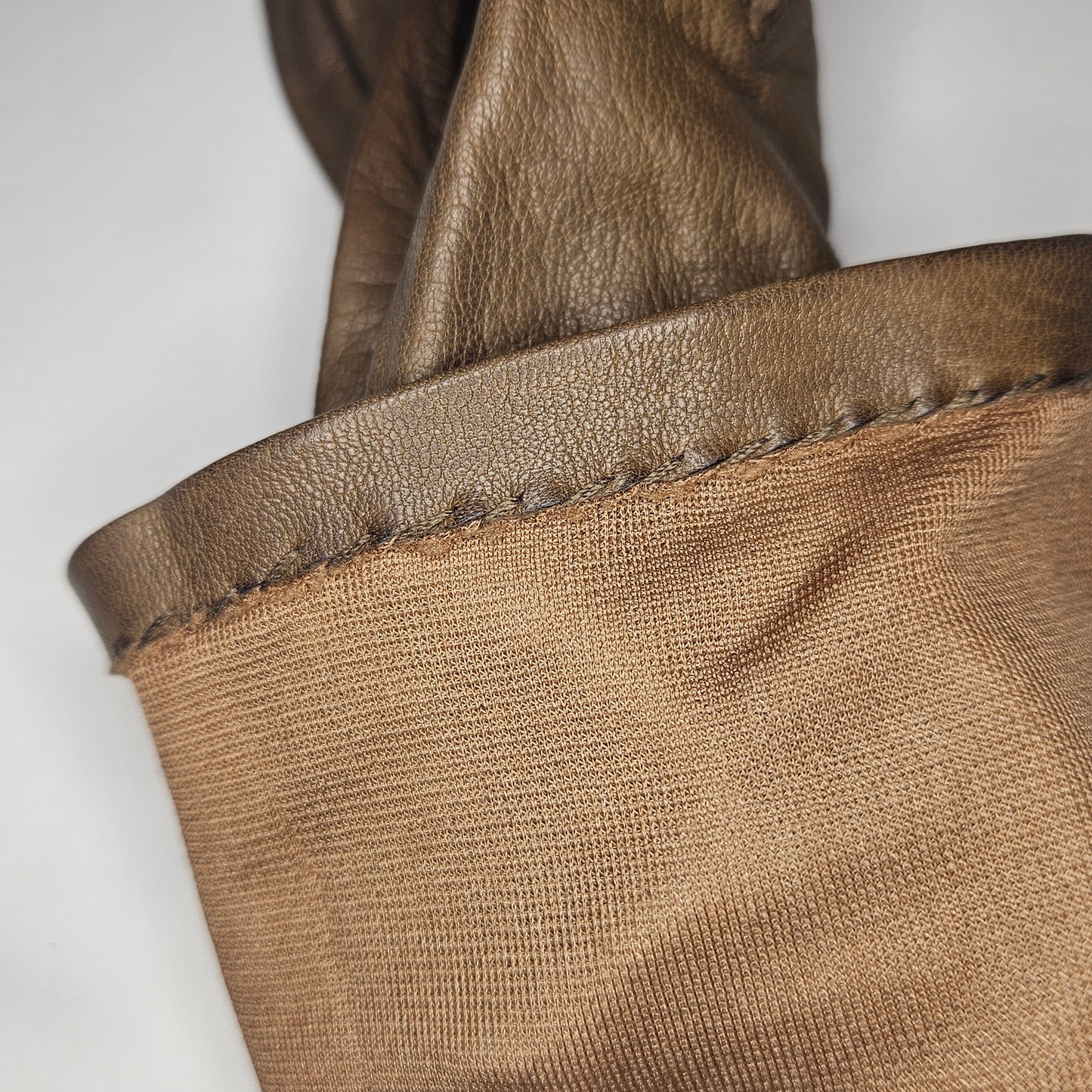 Vintage women's brown leather gloves by Grandoe, size 6.5, silk lined