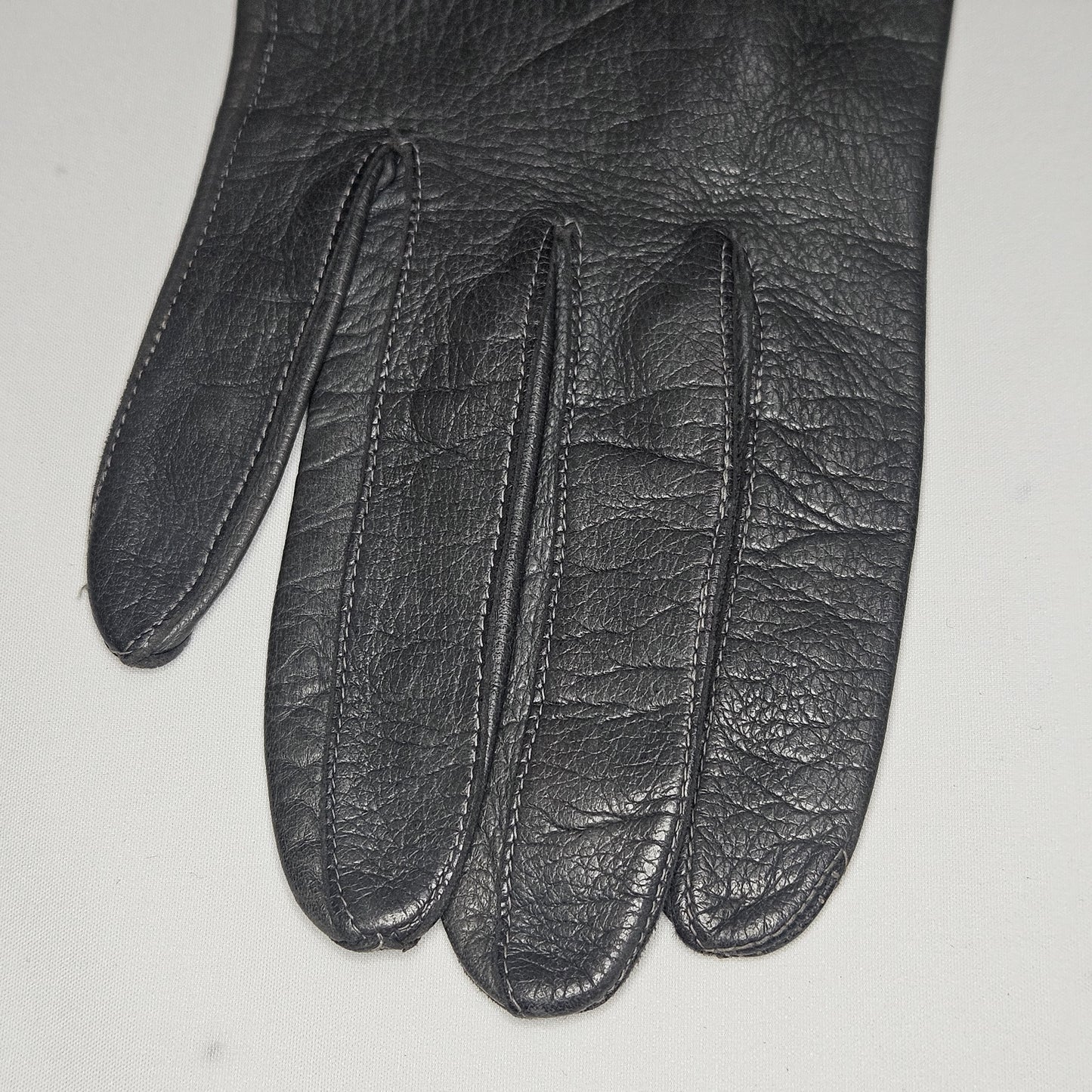 Vintage women's long grey leather unlined gloves. Made in Italy for Macy Associates.