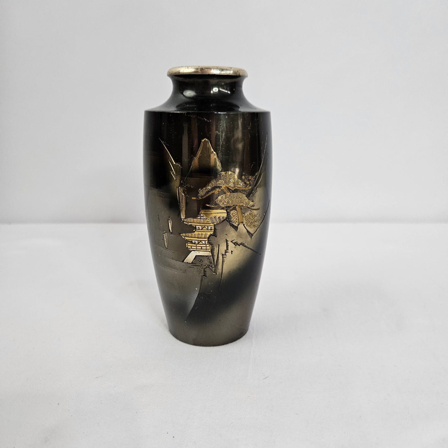 Black enamel vase with Japanese inspired landscape scene and gold accents