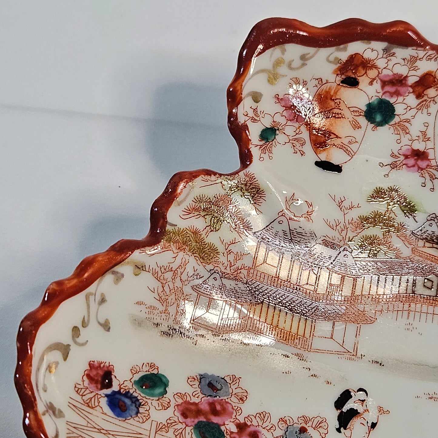 Geisha girl vintage hand painted plate, leaf shaped