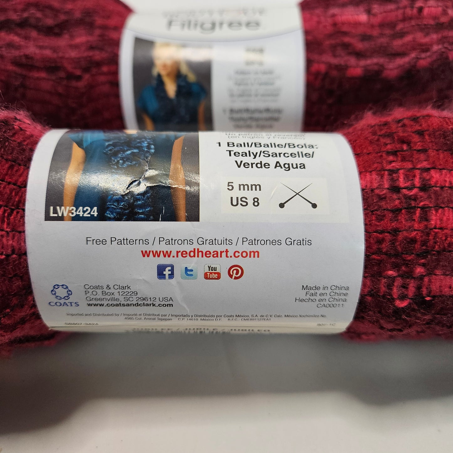 Red Heart Filigree super bulky yarn, color Jubilee 2 skeins