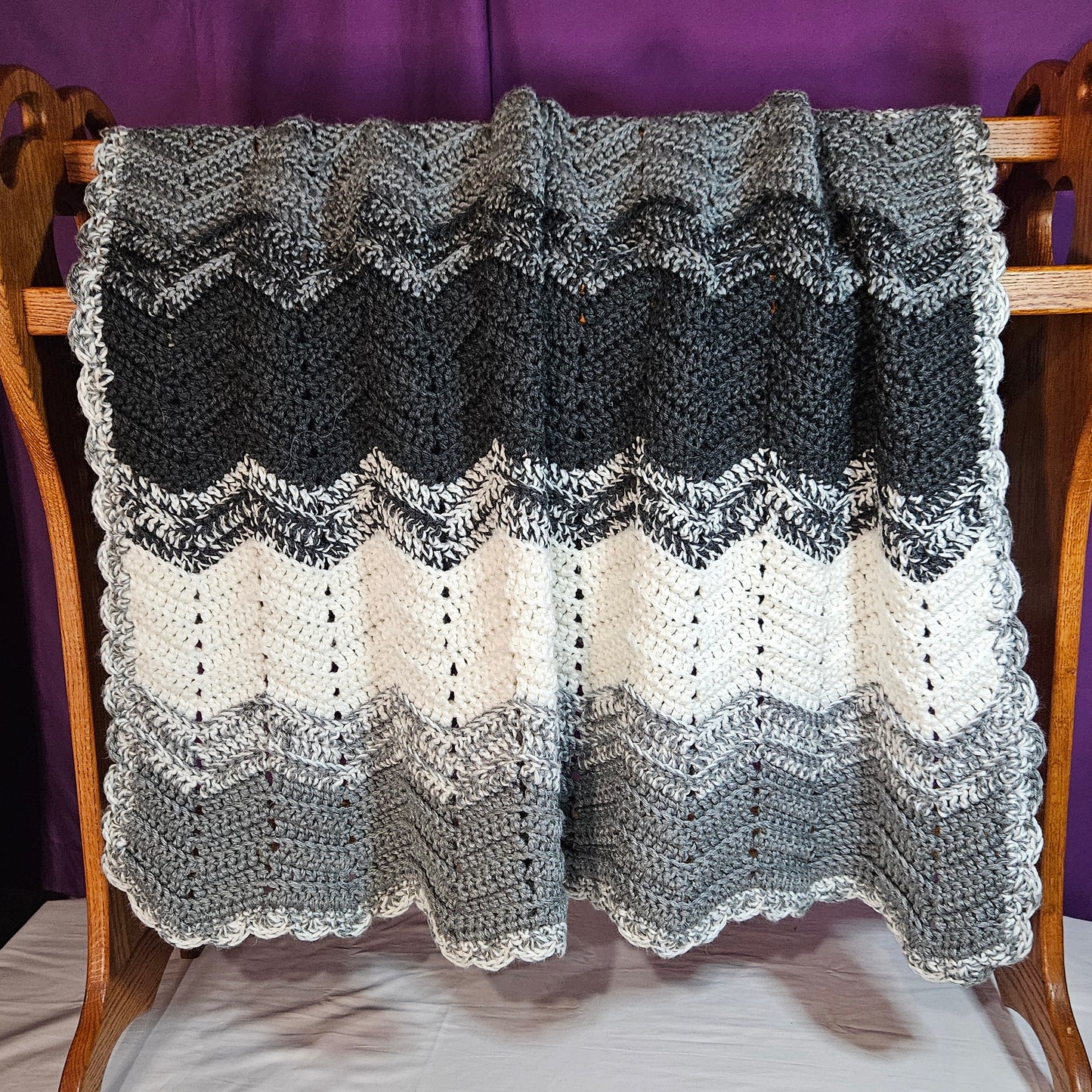 Handmade crochet heavy blanket in black, white, and grey, 45" x 39"
