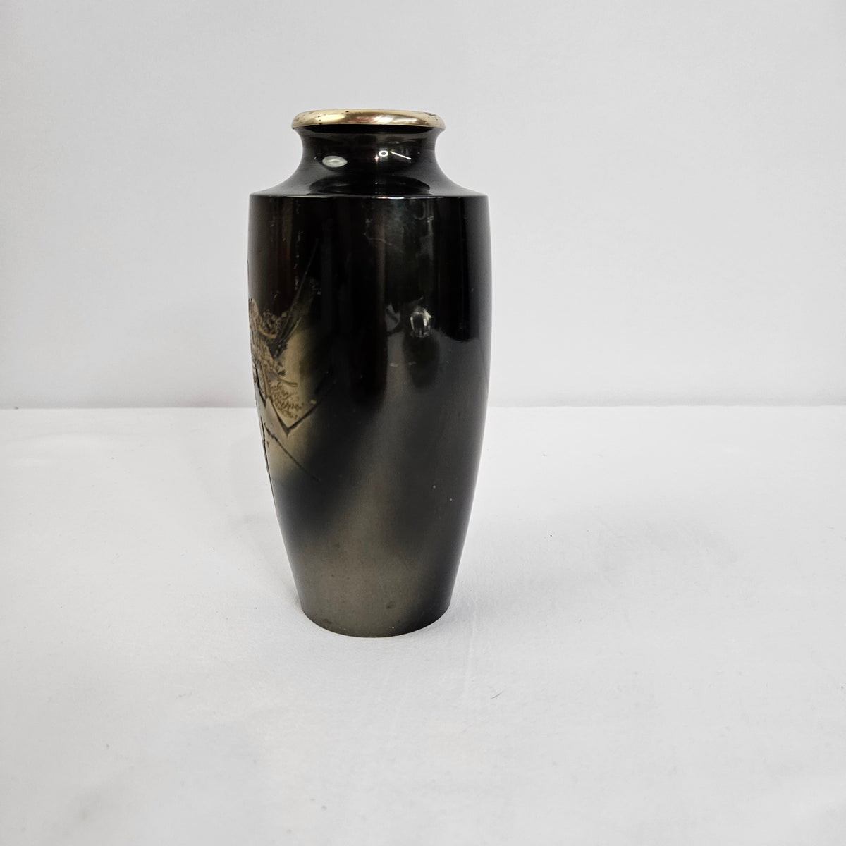 Black enamel vase with Japanese inspired landscape scene and gold accents
