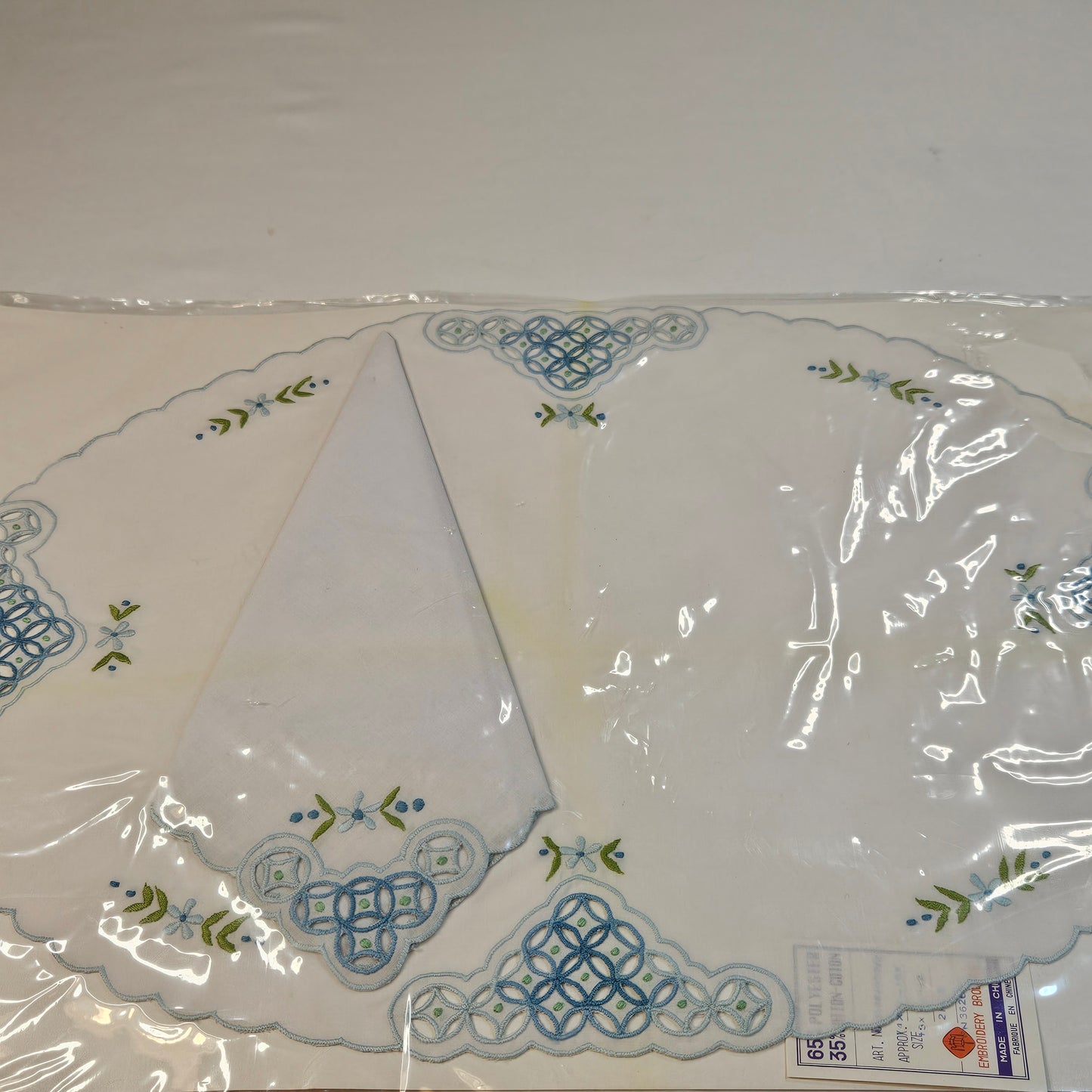 Vintage embroidered placemats and napkins, set of 8, never used