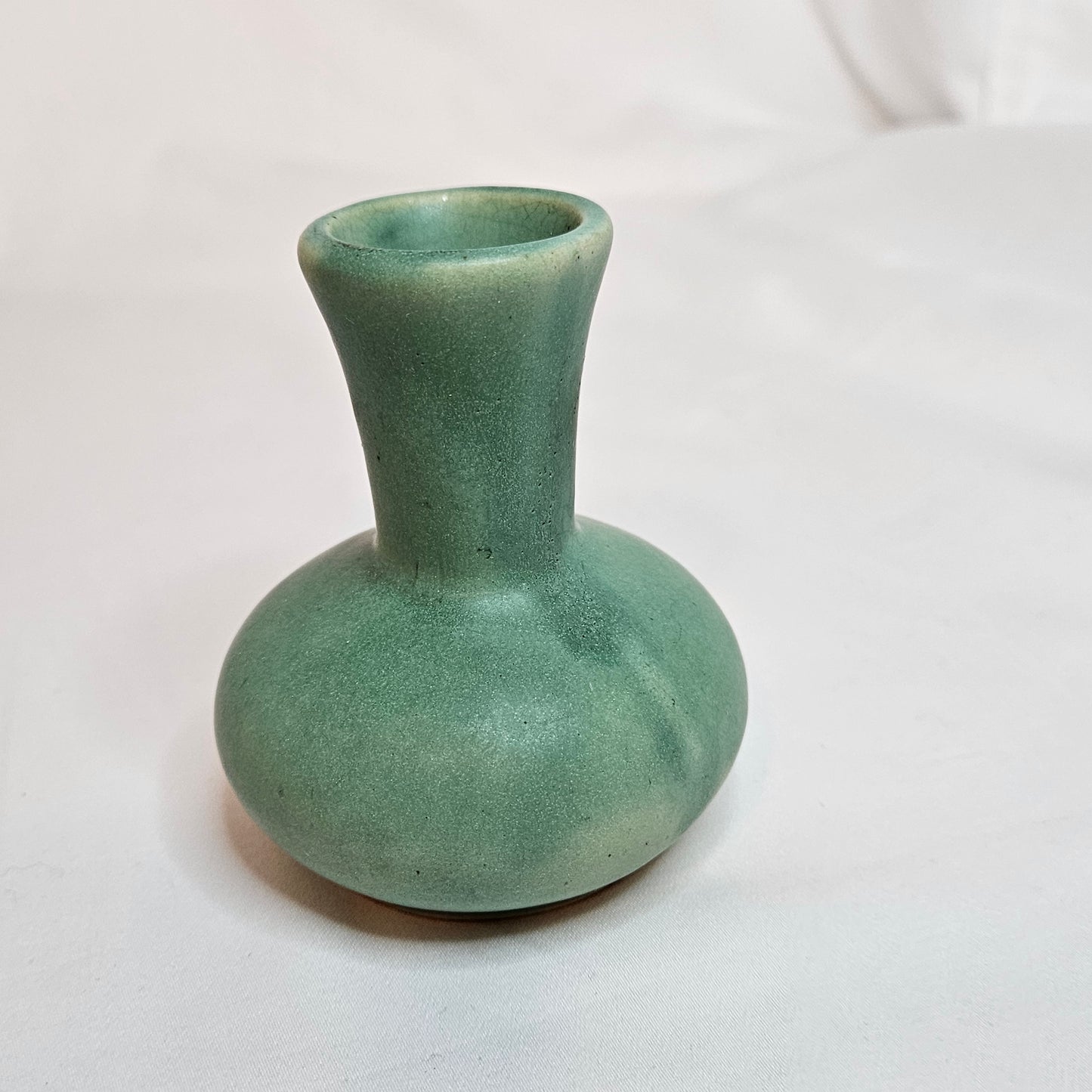 Vintage Niloak Pottery small green bud vase, 3.75 inches tall
