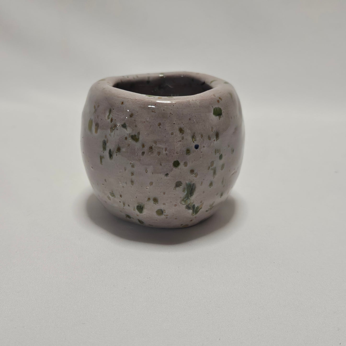 Handmade small primitive bowl, Pink and Green glaze, signed M.R.