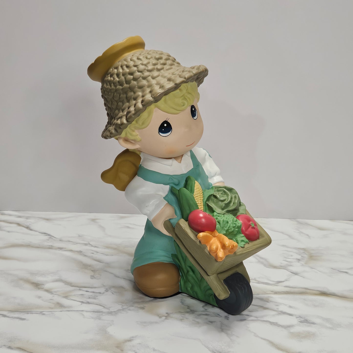 Precious Moments 10" figurine, Angel Boy with Wheelbarrow