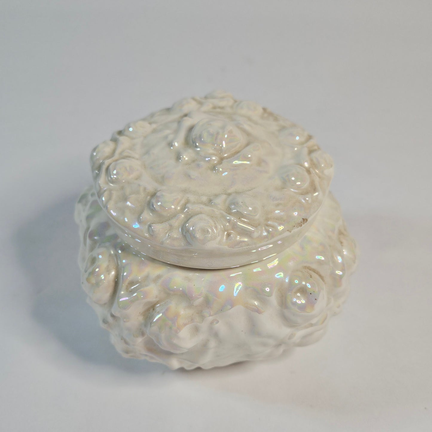Vintage porcelain trinket box, iridescent white, rose pattern