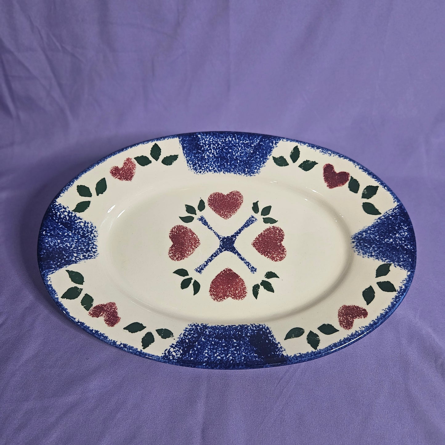 Spongeware oval platter with heart motif, 10x15,