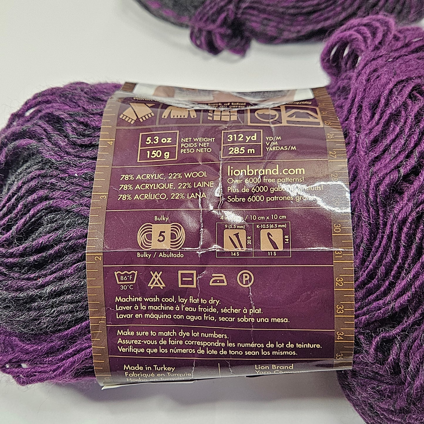 Lion Brand Scarfie yarn, Charcoal/Magenta, 1 1/2 skeins, 5 bulky
