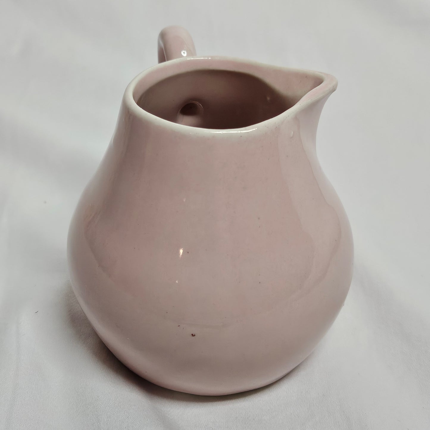 Niloak small creamer pitcher, light pink, 4 inches tall