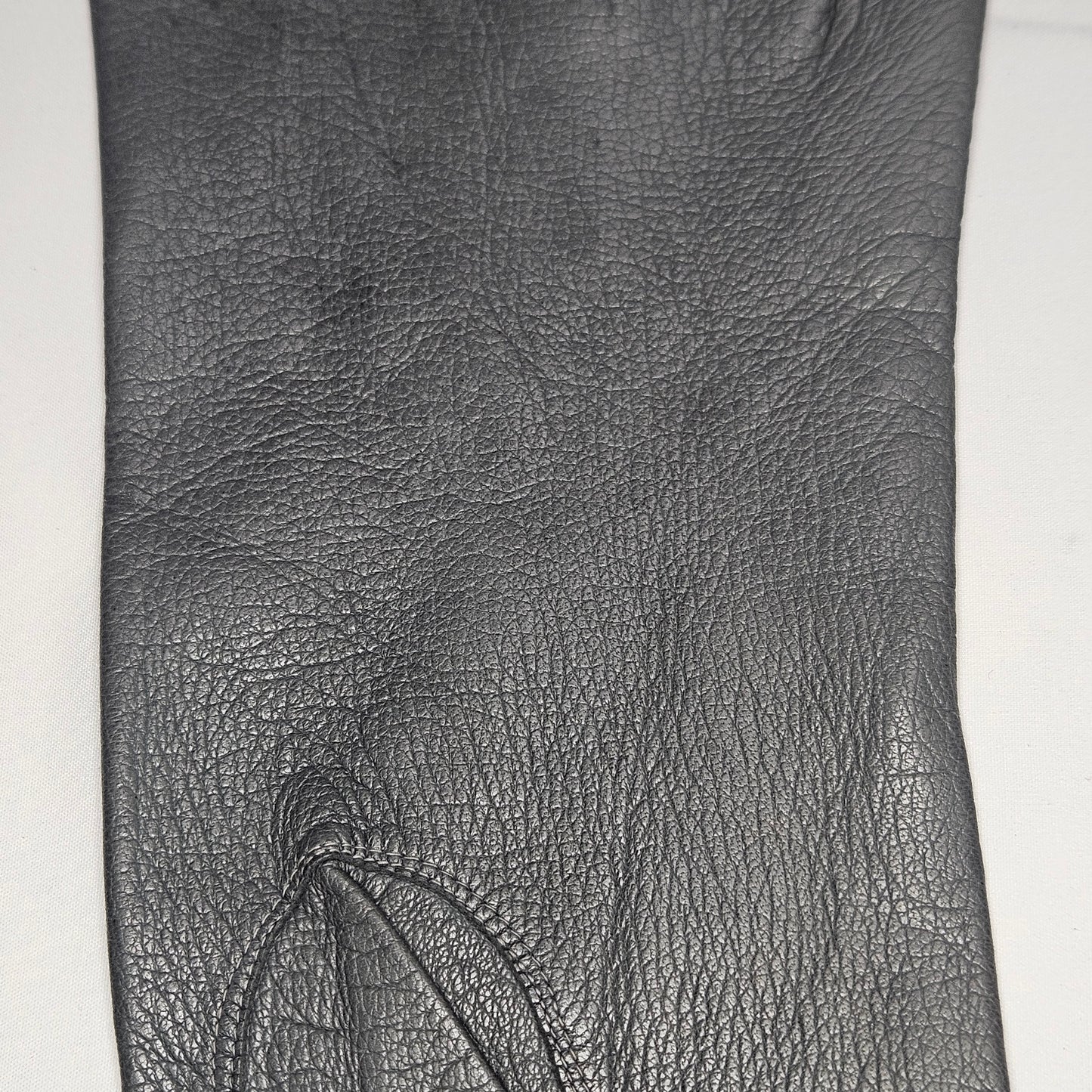 Vintage women's long grey leather unlined gloves. Made in Italy for Macy Associates.