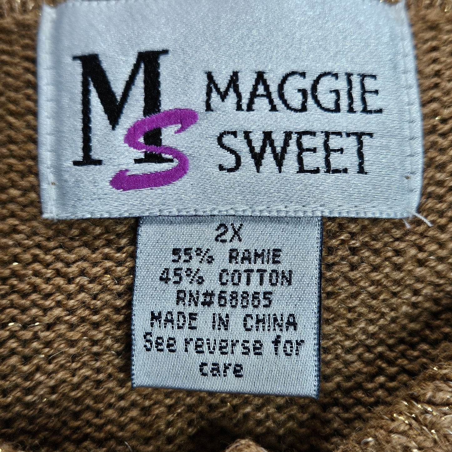 Maggie Sweet long-sleeve sweater with button-up collar, metallic thread accents