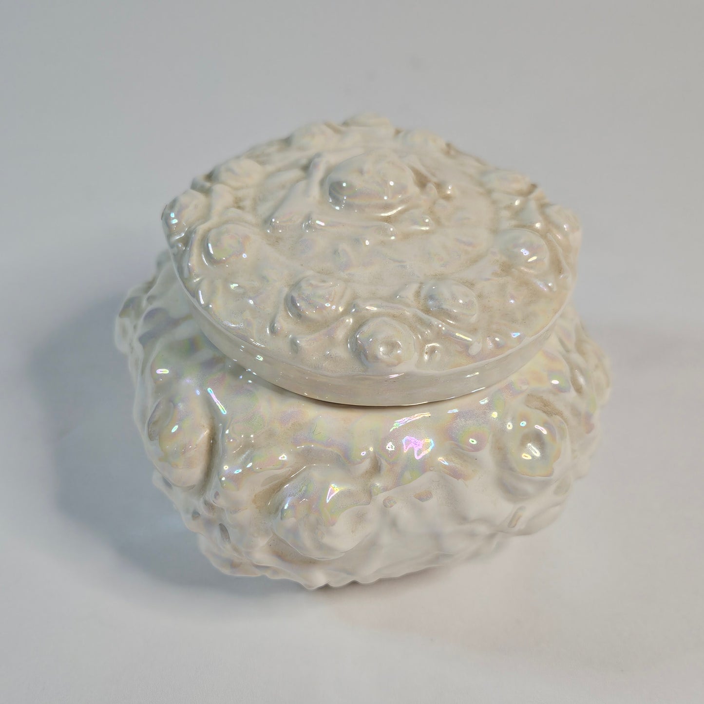 Vintage porcelain trinket box, iridescent white, rose pattern