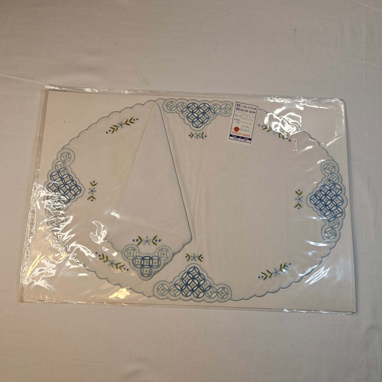 Vintage embroidered placemats and napkins, set of 8, never used